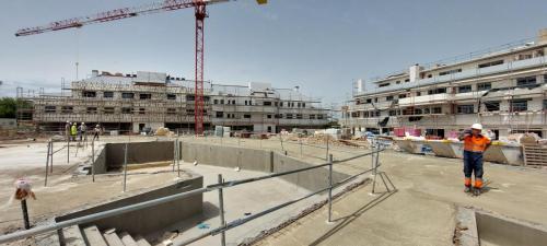 Promoción de 70 viviendas con piscina y urbanización privada en Villalbilla (Madrid)